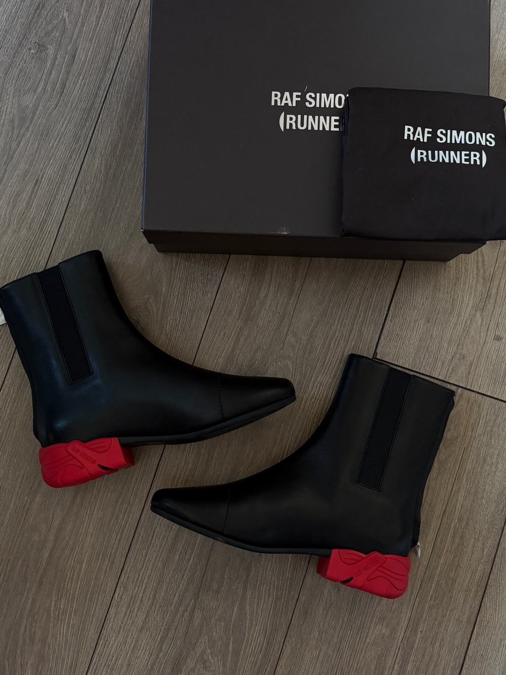 Raf Simons Black Leather Chelsea Boots with Red Sculpted Heel